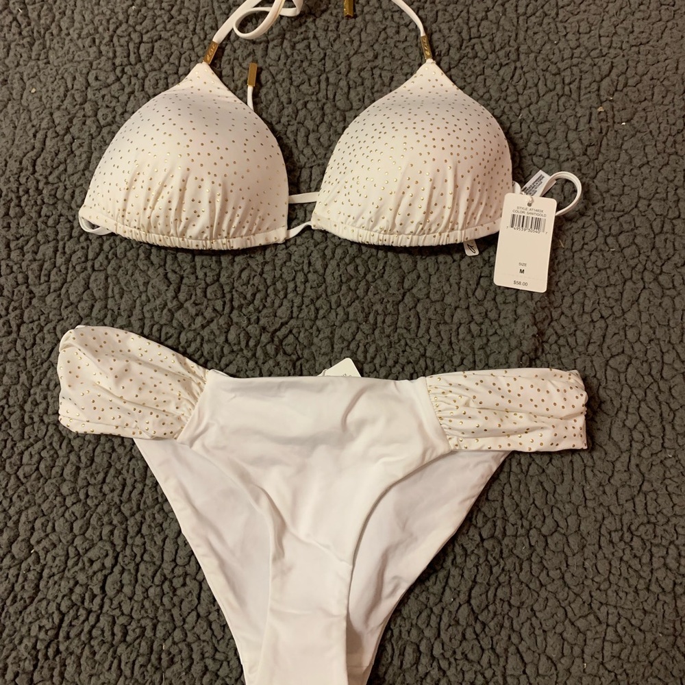 White and gold swim suit
